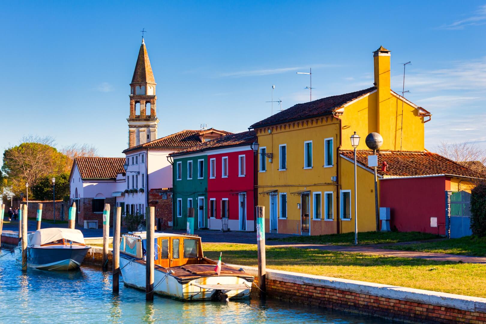 view-of-the-san-michele-arcangelo-bell-tower-and-the-colorful-houses-of-mazzorbo-venice